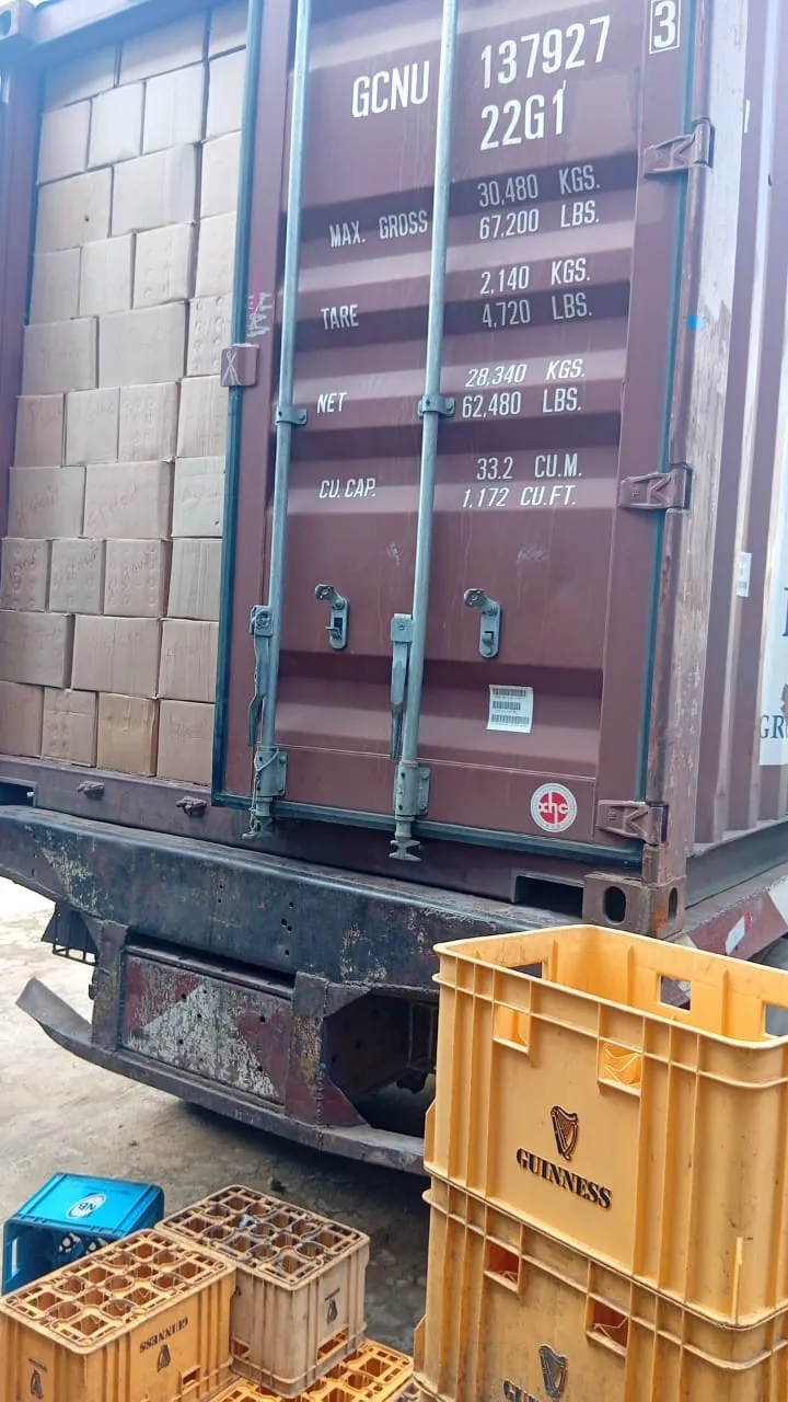 Cartons packed floor to ceiling inside a 20ft shipping container